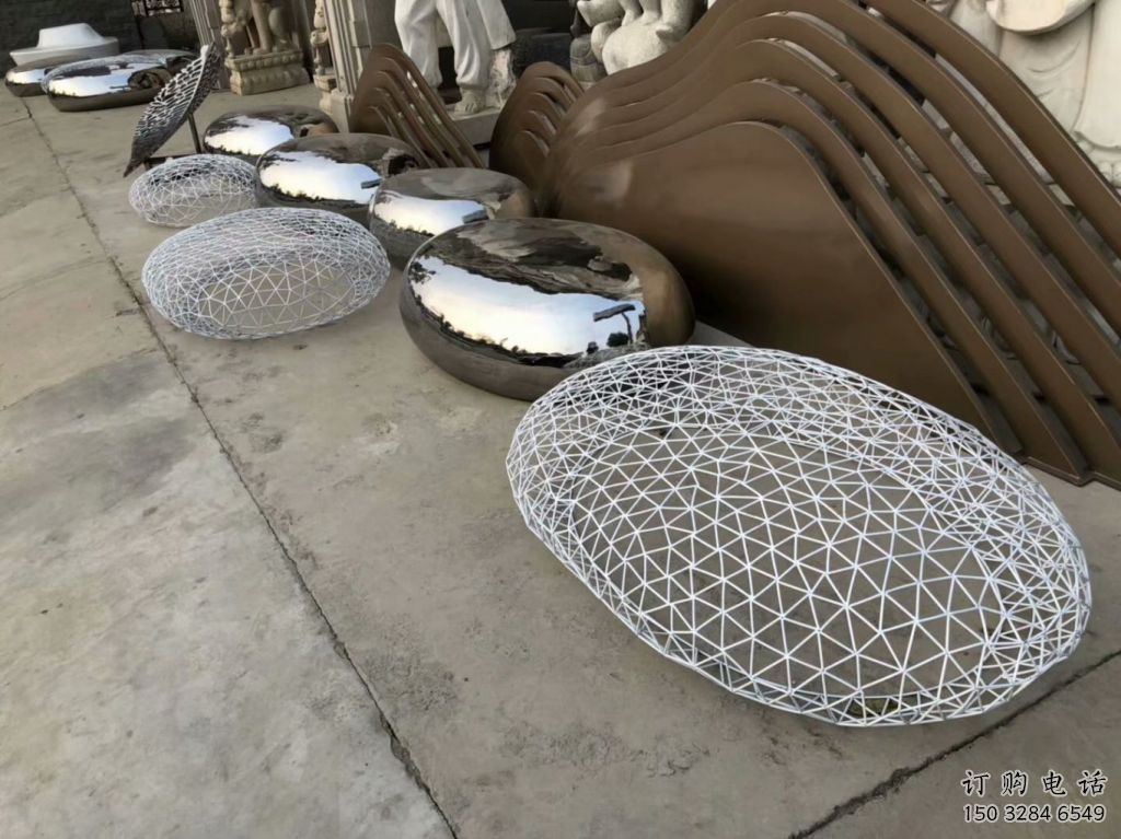 房地產(chǎn)鵝卵石雕塑廠家 鏤空擺件 鍛造不銹鋼鵝卵石雕塑