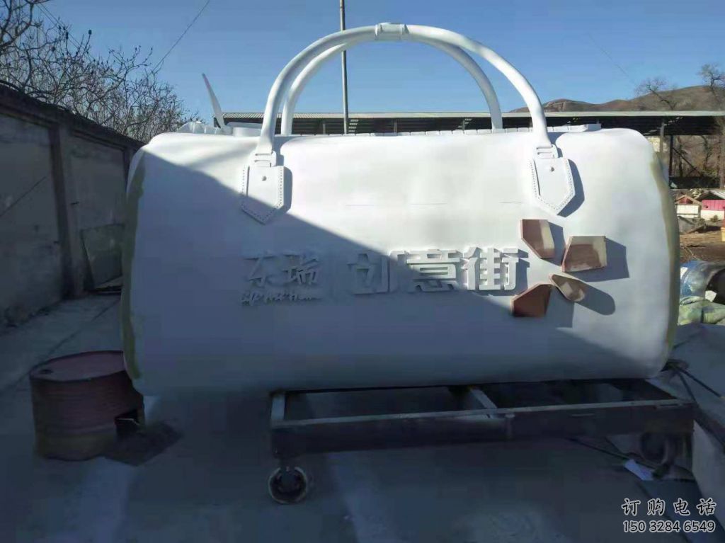 庭院提包雕塑廠家 廣場小品 鍛造不銹鋼提包雕塑制作