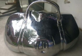 房地產提包雕塑廠家 公園擺件 鏡面不銹鋼提包雕塑生產