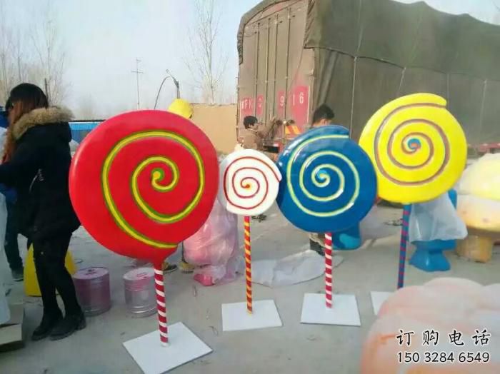 烤漆棒棒糖雕塑廠家 現(xiàn)代小品 創(chuàng)意棒棒糖雕塑加工廠