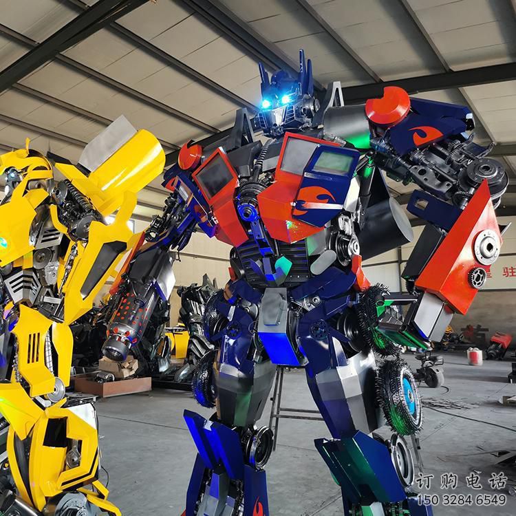 抽象變形金剛雕塑廠家 現(xiàn)代小品  戶外變形金剛雕塑制作