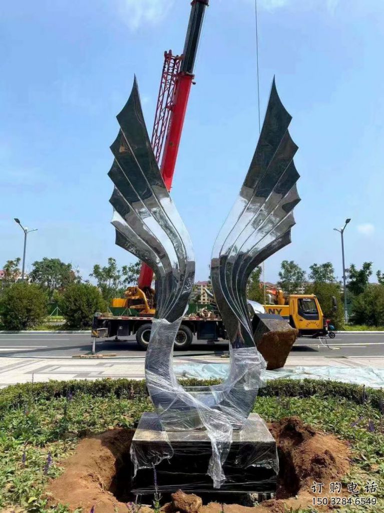 園林翅膀雕塑廠家，噴漆景觀雕塑，網格形式