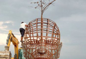 鐵藝人頭像雕塑制造商,室外軟裝,鏤空人頭像雕塑制作承接