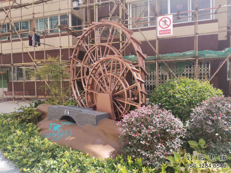 景觀水車雕塑供需，彩鋼制作，大型水車雕塑公司