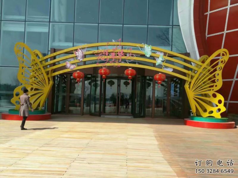 鄂爾多斯蝴蝶拱門雕塑，鏤空烤漆效果，不銹鋼小區(qū)標(biāo)識雕塑